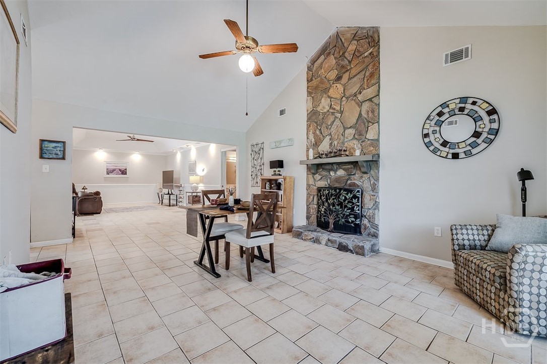 The current dining area flows into the quiet large living room .