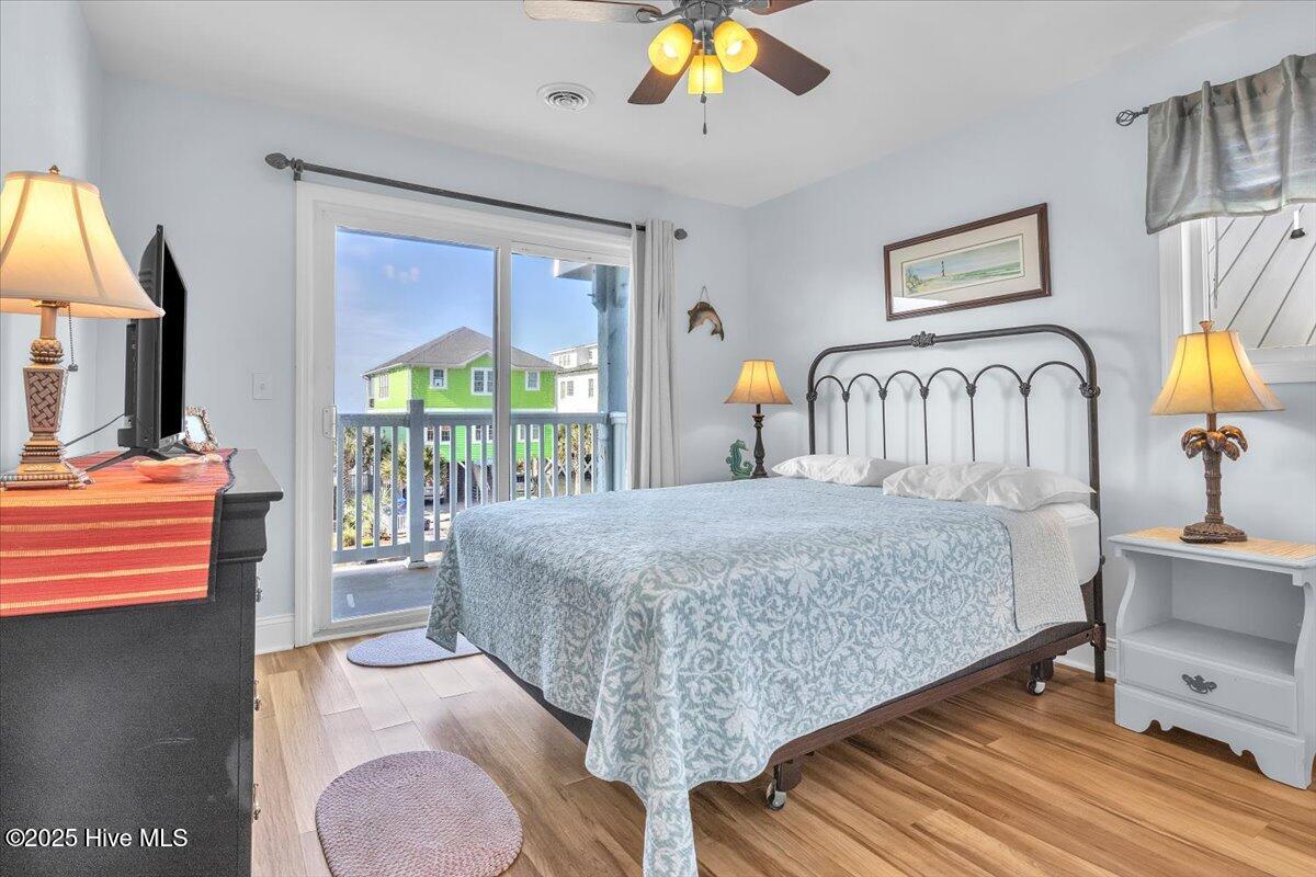 2714 W Beach Drive # 106, Oak Island, NC 28465 – photo 11: Primary Bedroom