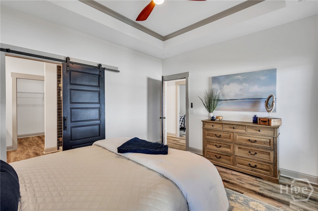 PHOTOS OF A PREVIOUSLY BUILT BRINSON PLAN BY LAWRENCE ALEXANDER HOMES.