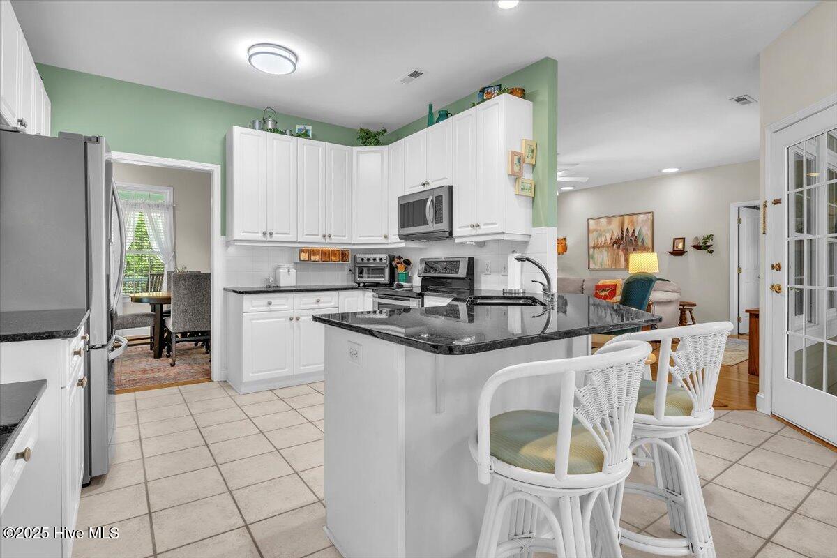 301 Wisteria Way, Caswell Beach, NC 28465 – photo 21: 21-Final 301 Wisteria Way Caswell Beach-