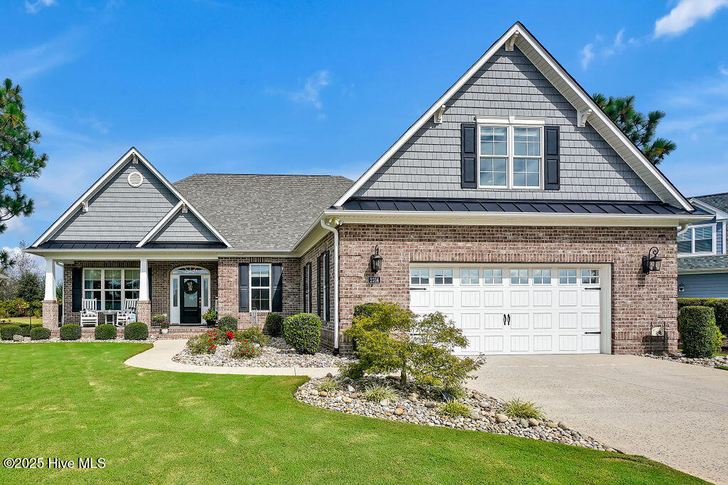 Welcome to an exceptional custom-built residence in the heart of Compass Pointe, redefining luxury living with meticulously upgraded features. Immaculate landscaping evokes the serenity of a pristine golf course. Inside, Goucho Hickory Wood flooring guides you through warm, inviting spaces. The great room boasts a magnificent gas fireplace flanked by custom shelving. A sun-soaked sunroom with dedicated HVAC and tile flooring offers direct access to the backyard.The kitchen is a dream for culinary enthusiasts, centered around an Italian Bertazzoni 5-burner gas stove and an expansive island with ample storage. Features include dovetail soft-close drawers, under-cabinet lighting, and a large walk-in pantry with dual access. French glass doors open to an office or den.On the main floor, the primary suite includes dual walk-in closets and a luxurious bath with tiled shower and privacy rain glass, separate vanities, and a linen closet. A second bedroom and full bath with an oversized jetted tub are also on the main level. The laundry room includes a built-in workspace and utility sink.Upstairs, a third bedroom (or bonus room) and full bath await, along with a large walk-in attic with shelving and a radiant barrier for extra storage. The garage features a 2-car layout, separate golf cart bay, epoxy flooring, a tiled pet shower, and a convenient drop zone.Additional upgrades include a surround sound system, 4-zone HVAC, home alarm, surge protection, and more.Compass Pointe offers resort-style amenities: Grand Lanai Clubhouse, indoor/outdoor pools, lazy river, championship golf, tennis, pickleball, a wellness center, trails, dog park, and more. Experience the pinnacle of luxury living! Welcome to an exceptional custom-built residence nestled in the heart of Compass Pointe, redefining luxury living with meticulously upgraded features. Immaculate landscaping welcomes you, evoking the serenity of a pristine golf course. As you step inside, Goucho Hickory Wood flooring guides you through its inviting spaces. The great room features a magnificent gas fireplace flanked by tasteful shelving. Discover the sunroom, this sun-soaked sanctuary boasts its dedicated HVAC zone, complemented by tile flooring and offering easy access to the meticulously landscaped backyard. The kitchen is a haven for culinary enthusiasts. An expansive island provides ample storage and prep space, with the Italian Bertazzoni 5-burner gas stove as its centerpiece. The thoughtful design extends to dovetail soft-close drawers, under-cabinet lighting, and a spacious walk-in pantry with dual access points. French glass doors lead to the office, that can be used as a den. On the first floor, the primary en-suite has dual walk-in closets and a sumptuous bathroom boasting a tiled shower w/ privacy rain glass, separate vanities, and a linen closet. The first floor also has a well-appointed bedroom and a second full bath, complete with an extra-large jetted tub. The expansive laundry room has a built-in workspace and utility sink. Venturing upstairs, you'll find the 3rd bedroom, easily adaptable as a bonus room. Upstairs also has a full bath and an additional storage space is found in the large walk-in attic, complete with shelving and a radiant barrier. The garage is a homeowner's dream, featuring a 2-car layout with a golf cart door with a dedicated parking space. It also boasts a tiled shower, perfect for pampering your furry friends, a convenient drop zone, and sleek epoxy flooring. This home offers numerous extras, including a surround sound system, a 4-zone HVAC split system, a home alarm system, surge protection, and a host of other premium features.Beyond the home, Compass Pointe offers resort-style amenities, including the Grand Lanai Clubhouse, indoor and outdoor pools, a lazy river, championship golf, tennis, pickleball, a wellness center, walking and biking trails, a dog park, and more. Don't miss the opportunity to experience the pinnacle of luxury living.