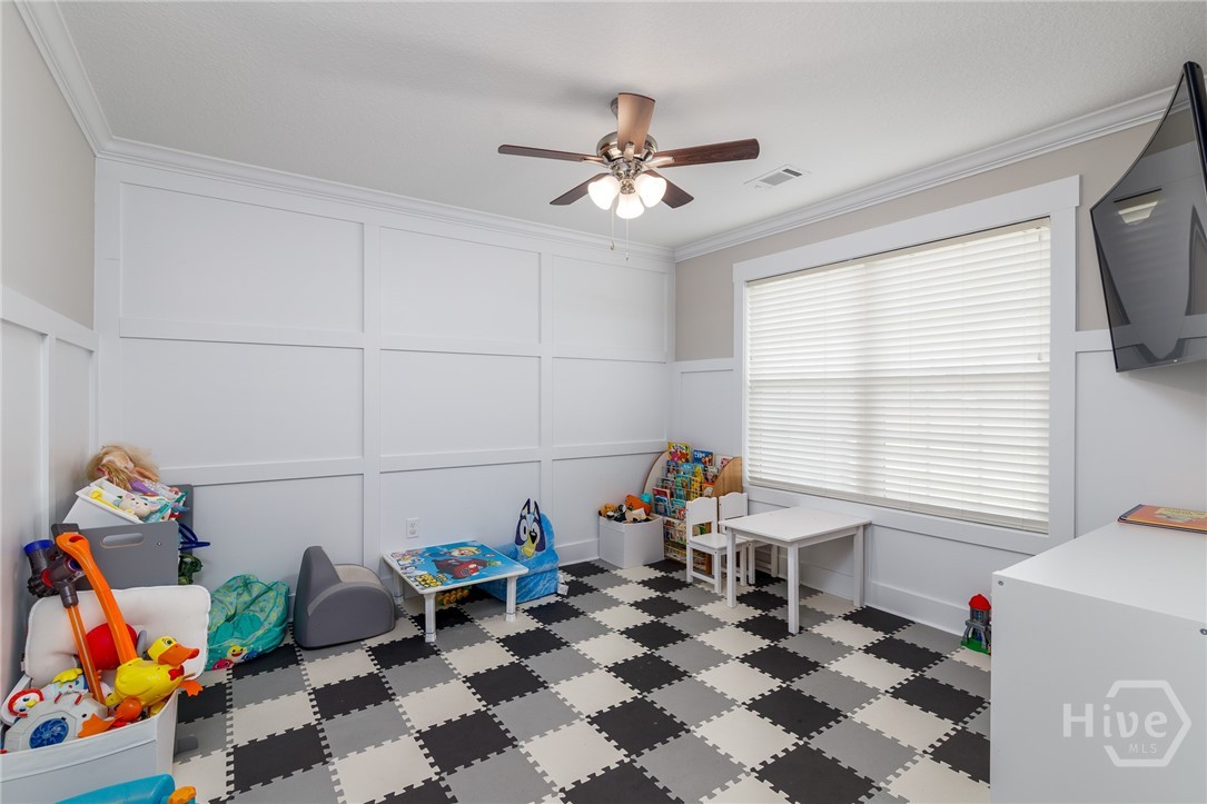 Note: the checkered pattern is an interlocking foam play mat in the front flex room / office. The flooring is LVP.