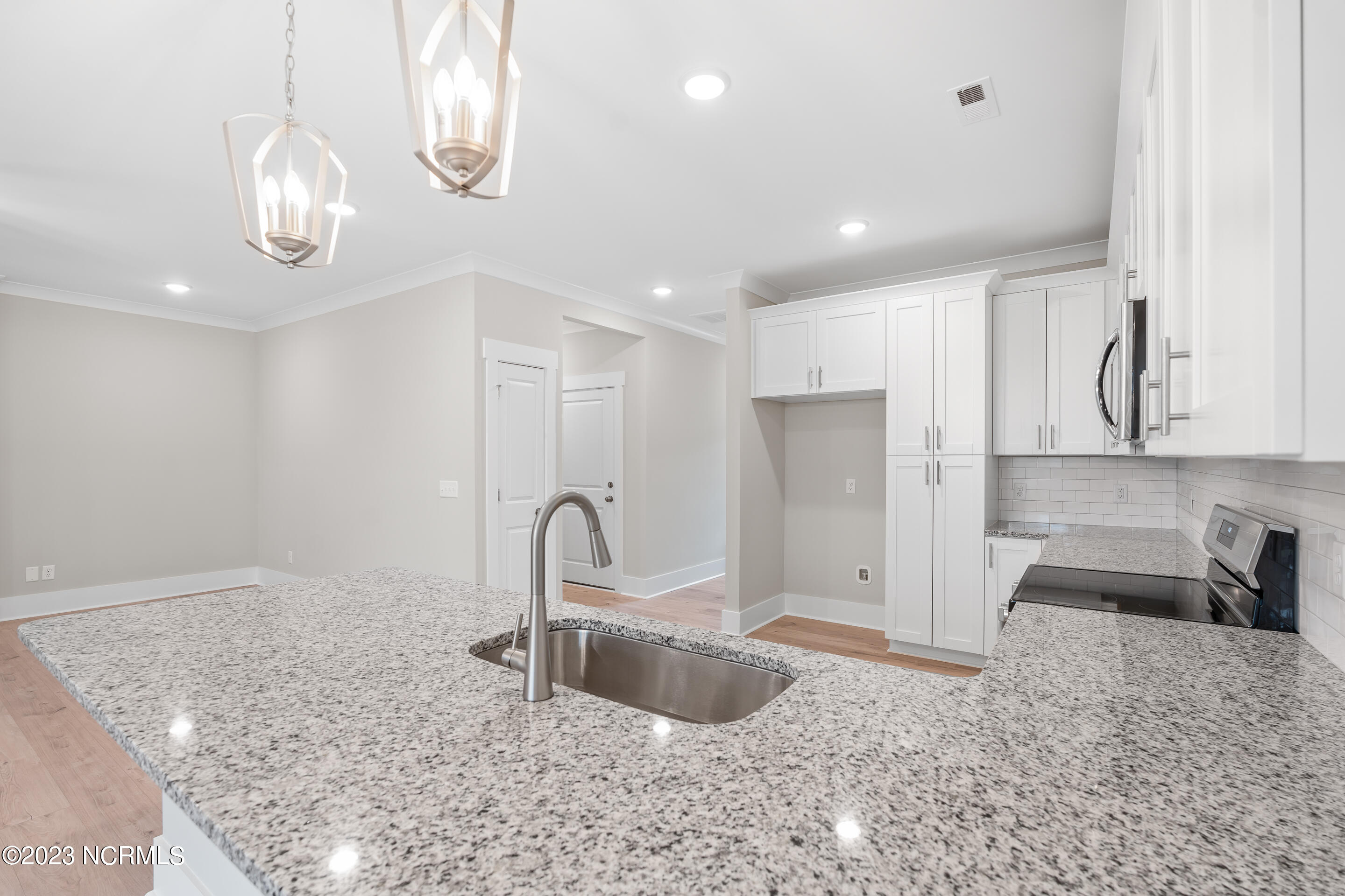 7447 Springwater Drive, Wilmington, NC 28411 – photo 9: 7402 Springwater Dr. MLS-11