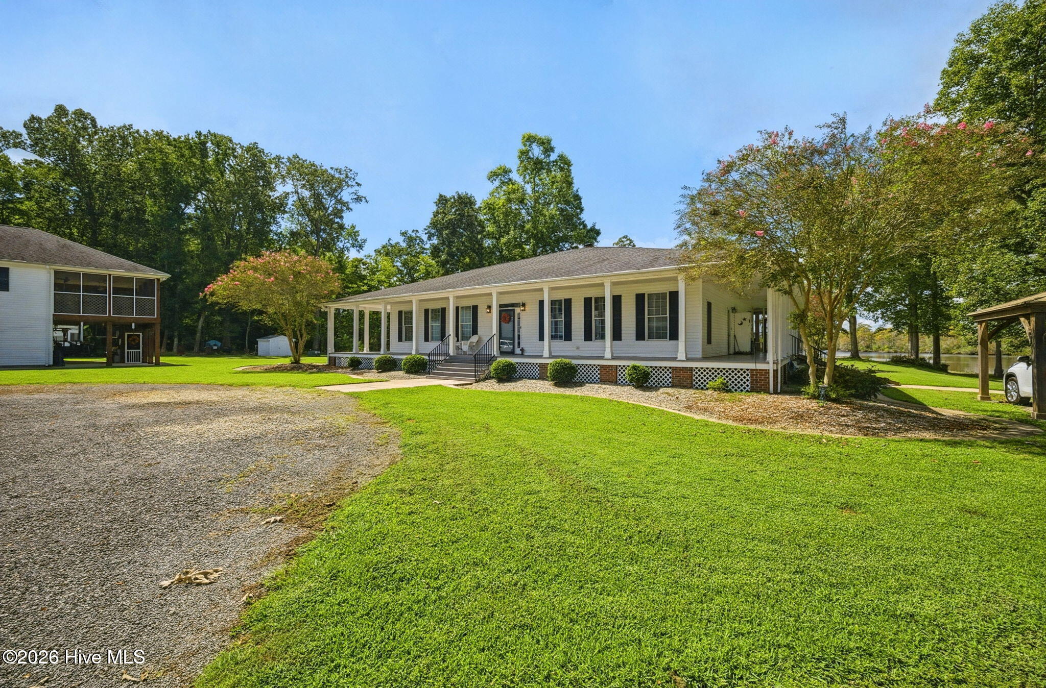 Waterfront home w/guest house over 3 car detached garage