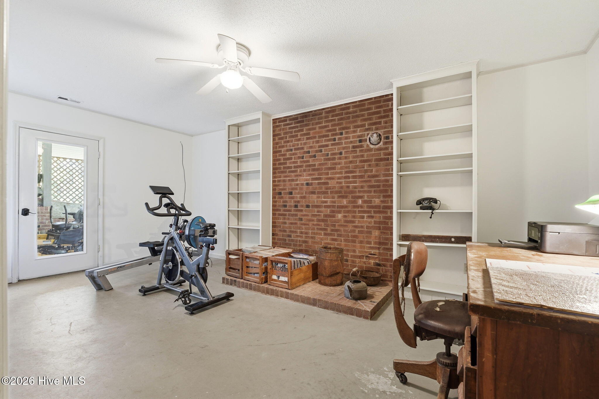 Office and exercise area. Stairs from the kitchen leads to this lower level.