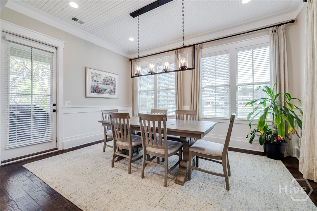 Dining area with side entrance to backyard