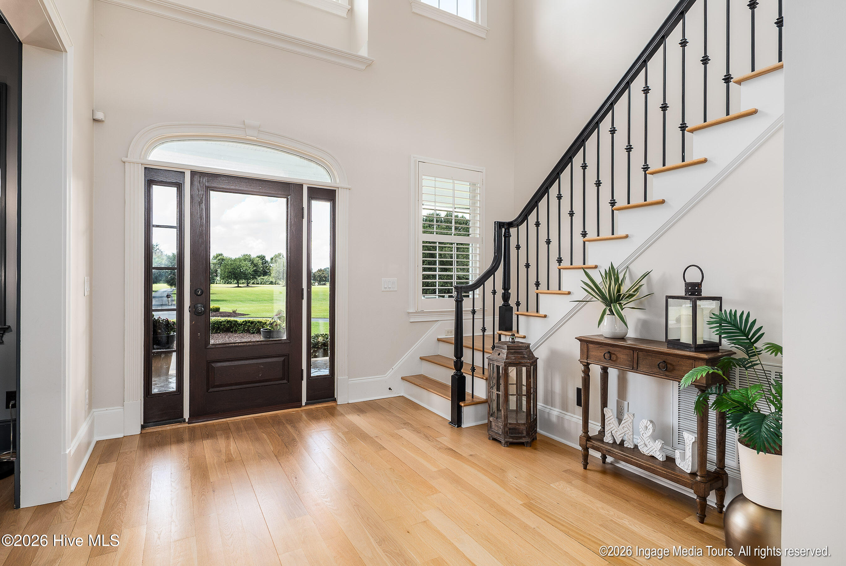 Entry Foyer with vaulted ceilings.