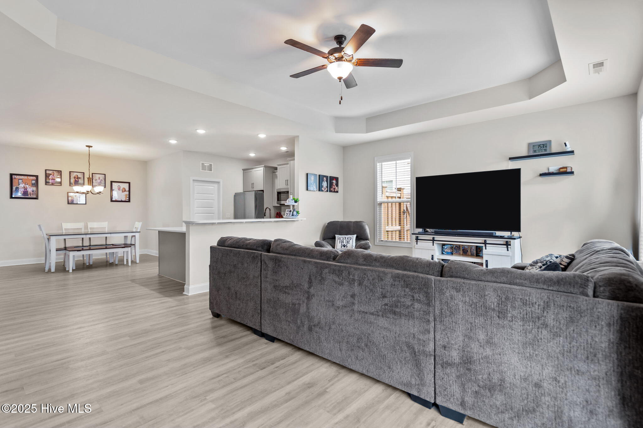 3990 Eclipse Avenue, Leland, NC 28451 – photo 10: 10-living_room_to_kitchen
