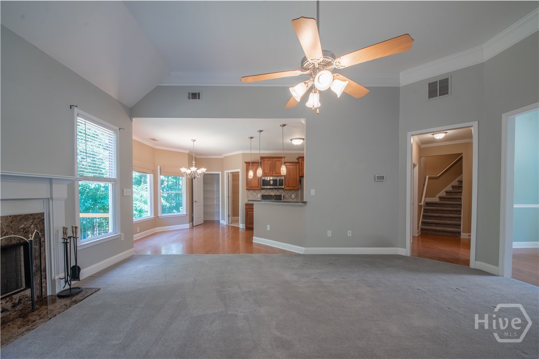 Living Room looking to Breakfast Room and Kitchen