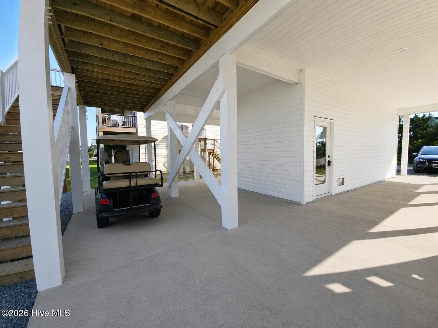 Virtually staged photo of golf cart parking area
