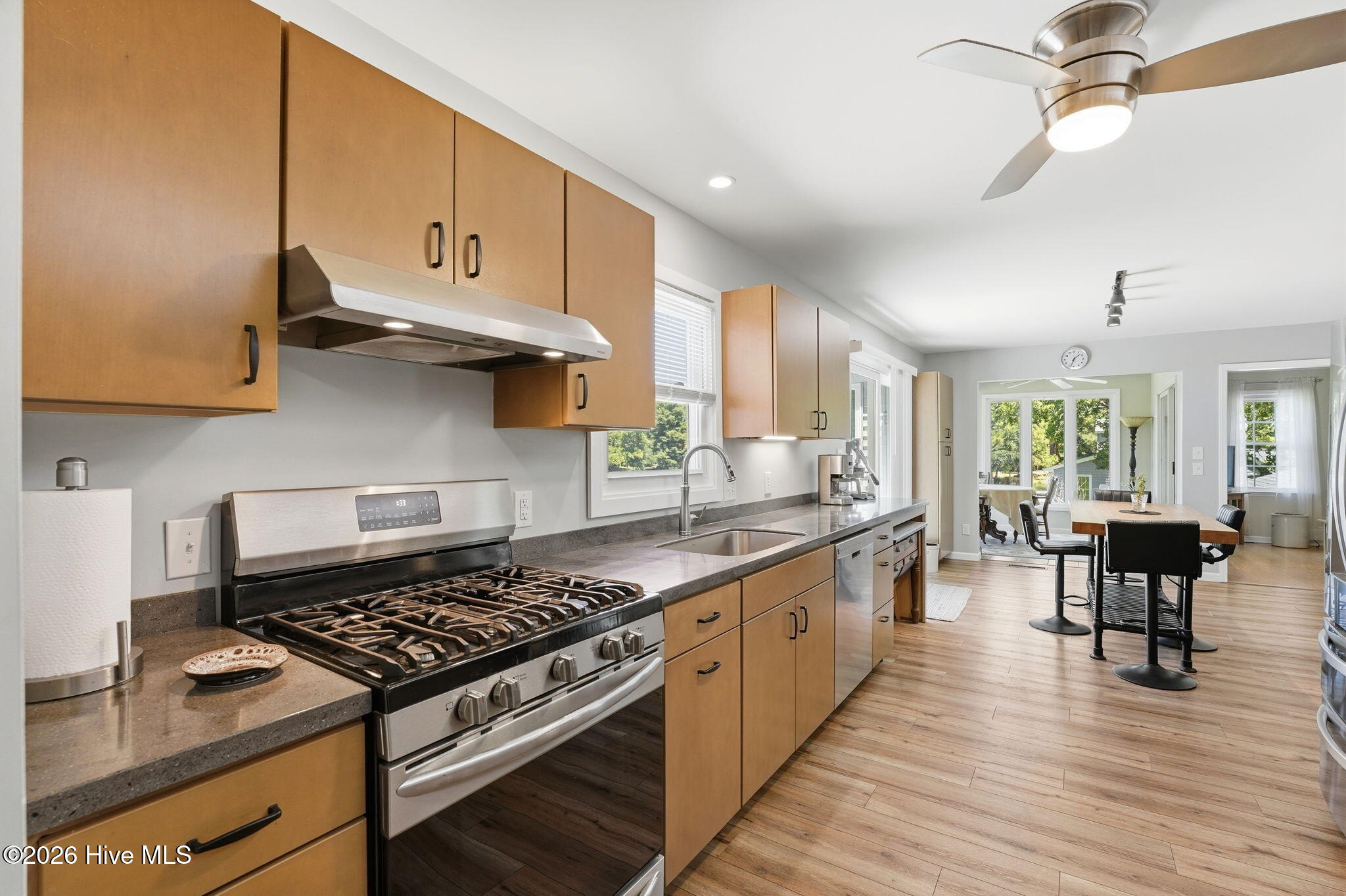 Gas stove in this kitchen. Beautifully renovated.
