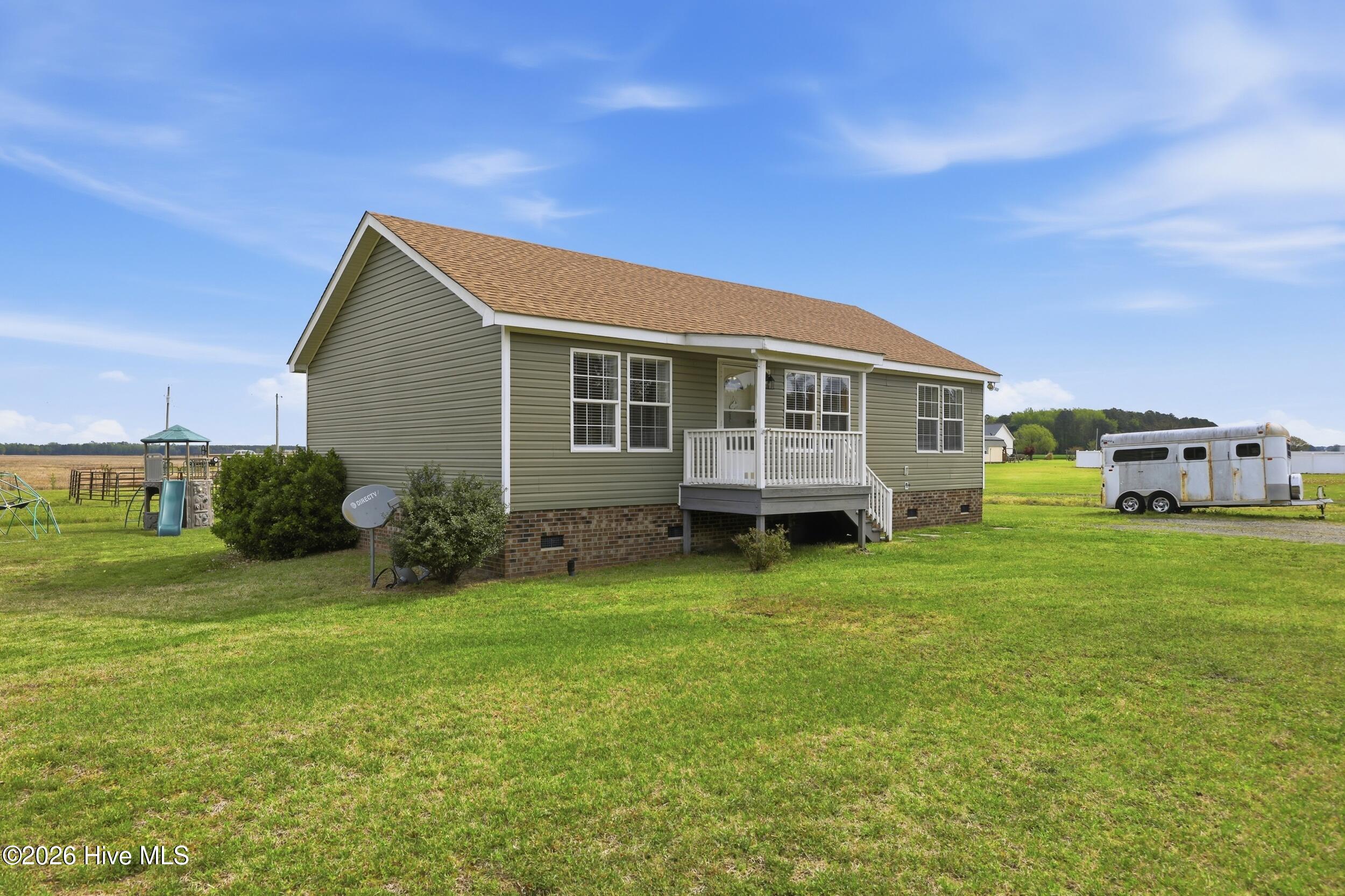 Exterior photo of 230 Lilly Road, South Mills, NC 27976. MLS: 100599389