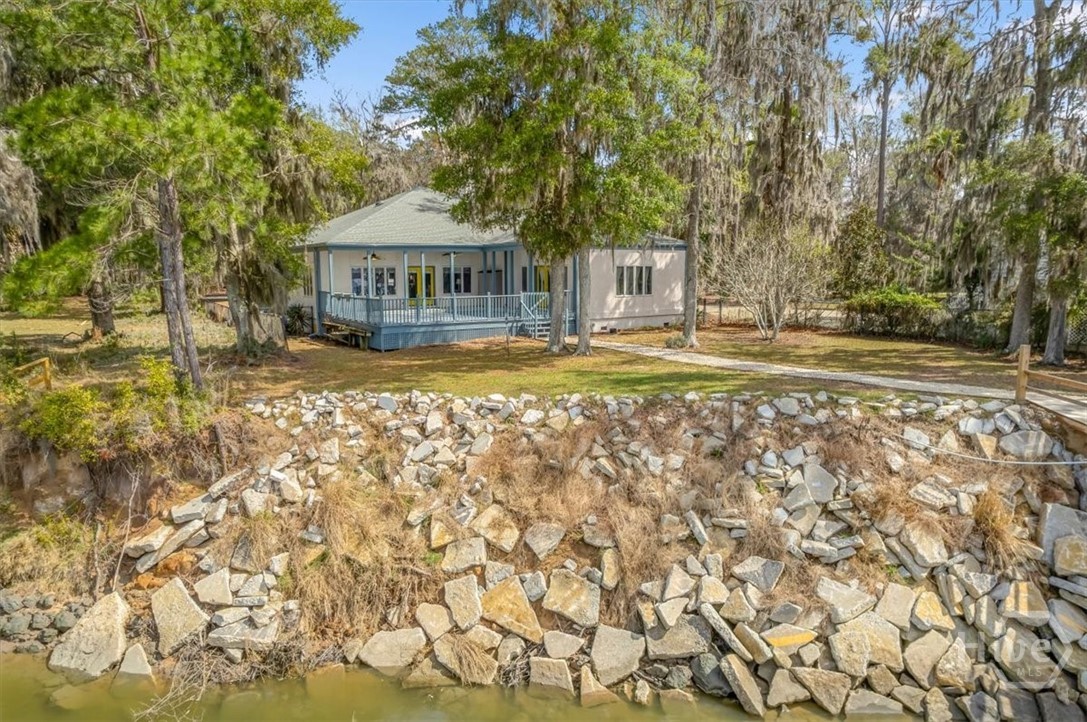 View of House and Bank from River