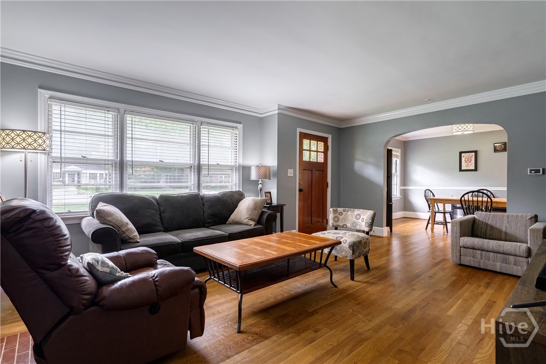 Living Room with Archway to dining room
