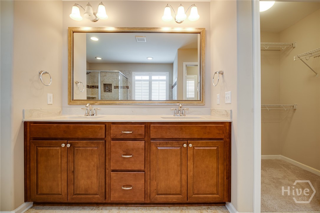 Dual Vanity next to a 2nd walk-in closet