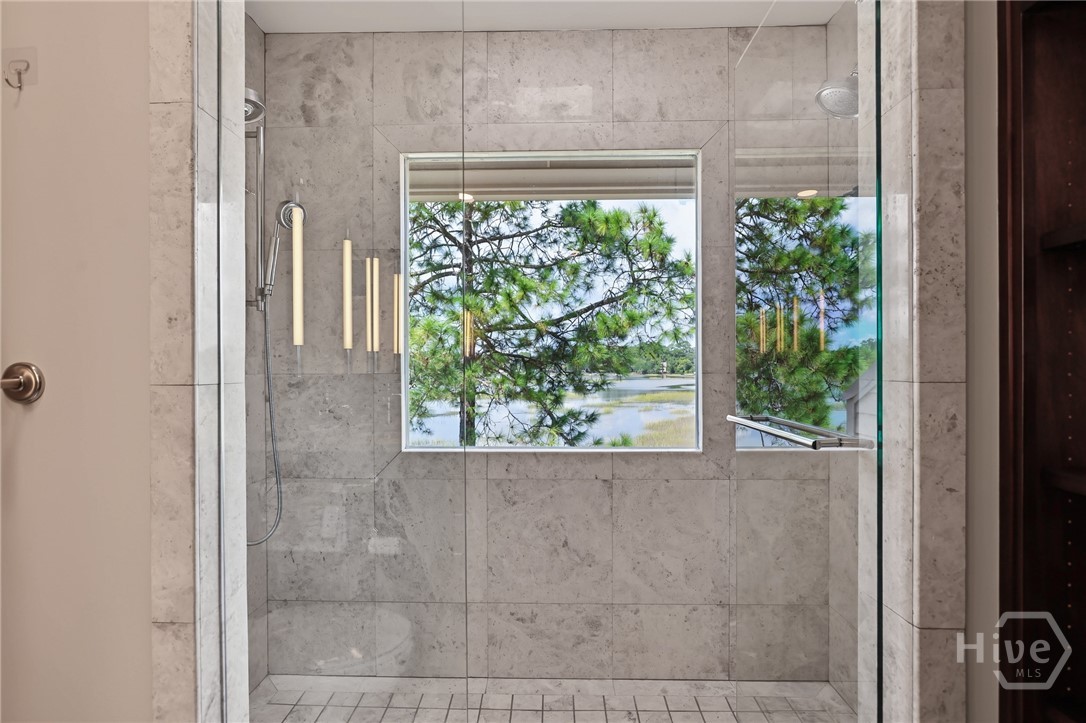 Gorgeous shower with dual shower heads and spectacular view!