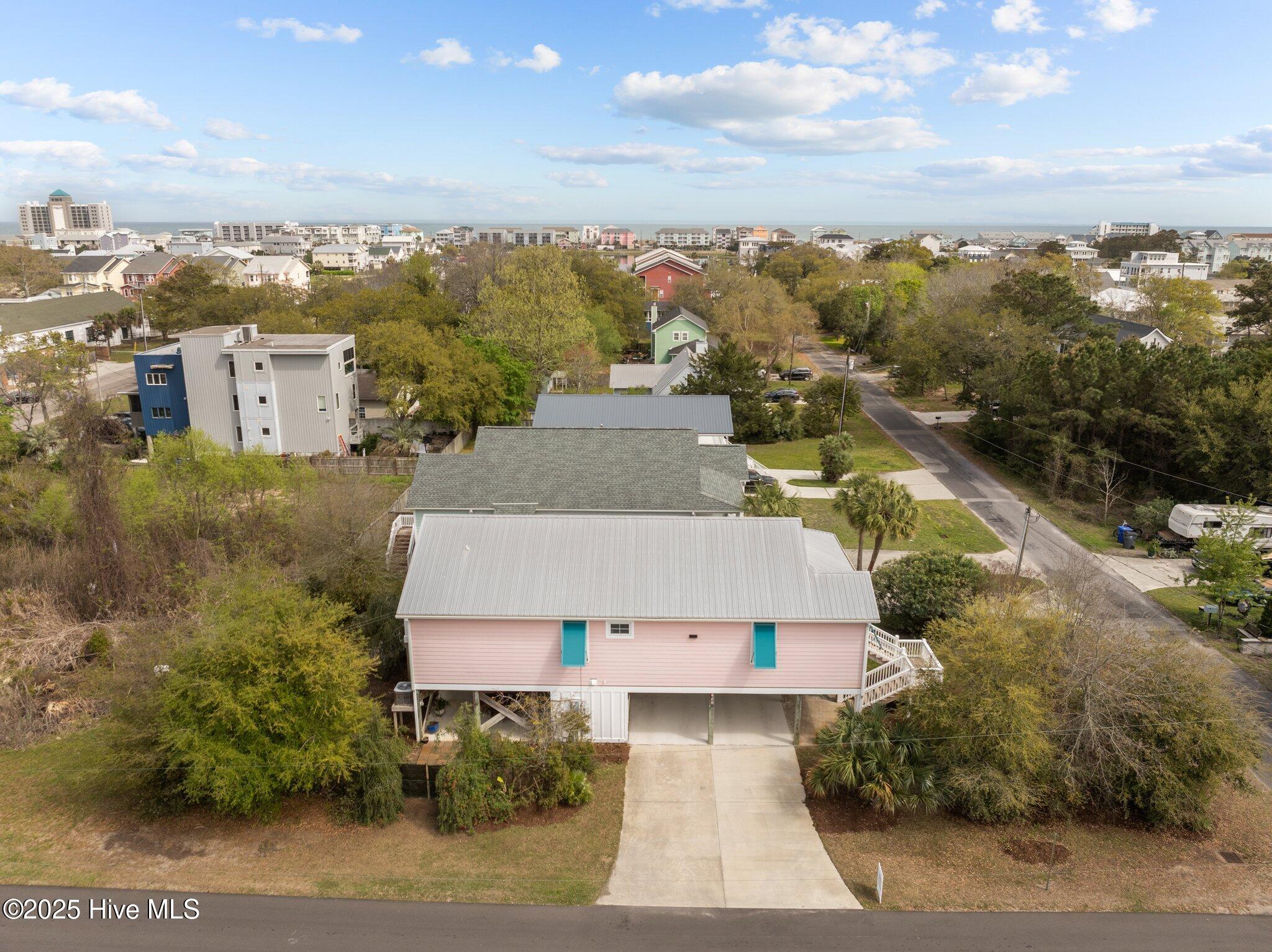 418 Columbia Avenue, Carolina Beach, NC 28428 – photo 4: 5-web-or-mls-DJI_20250402124408_0723_D