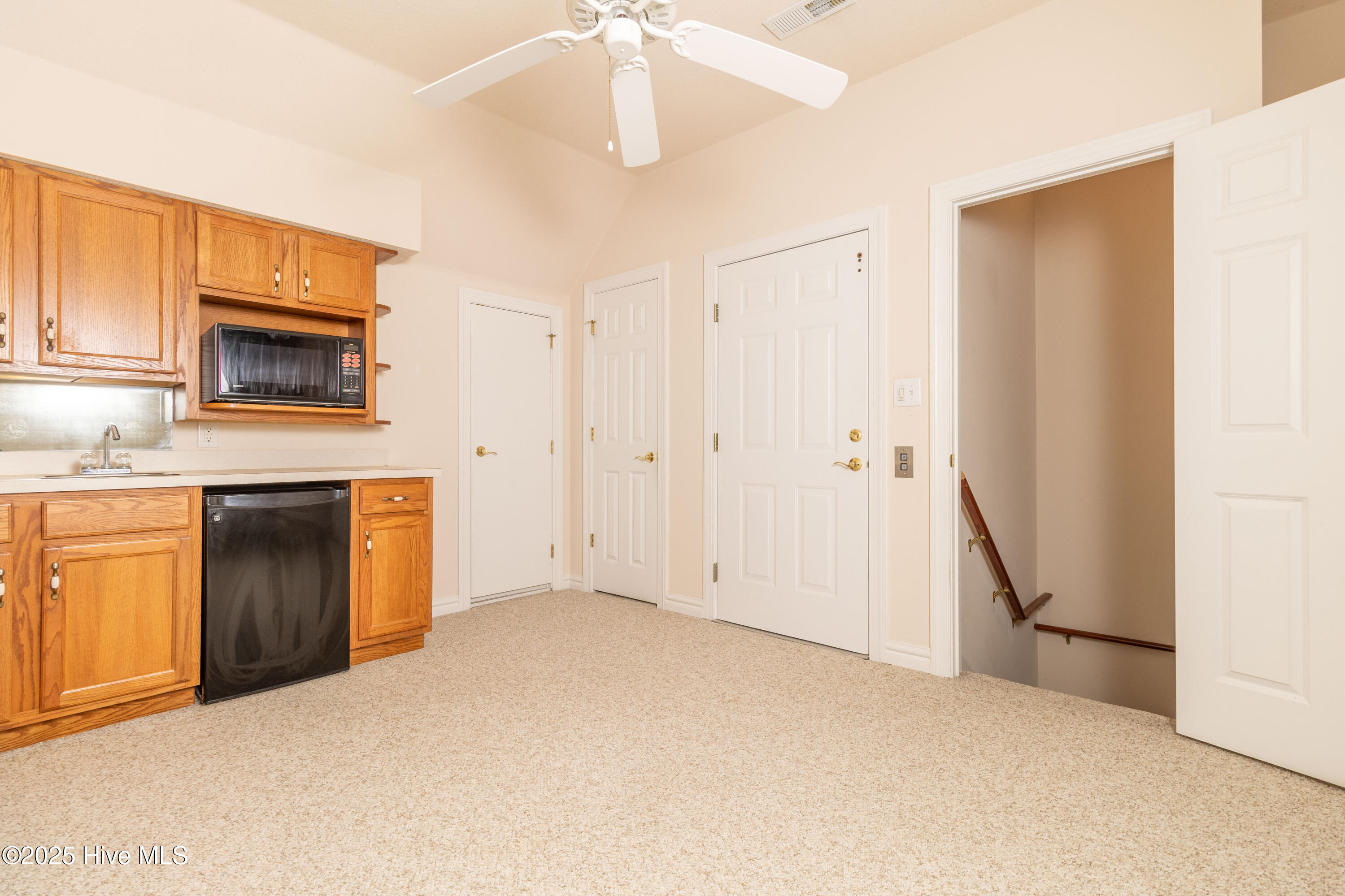 Private suite living area over garage