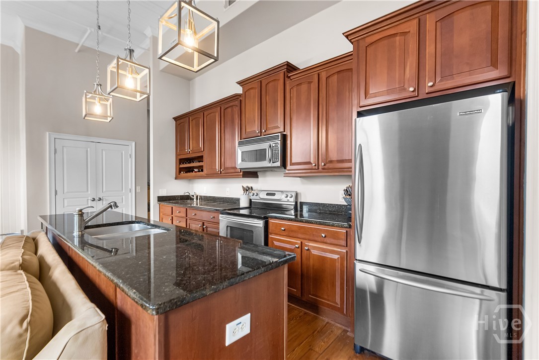 Gourmet kitchen with stainless steel appliances.
