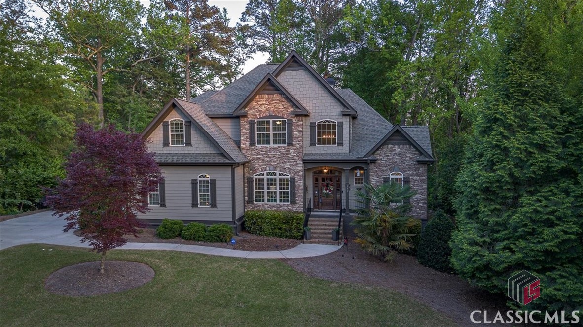 Now Priced at Appraised Value! Rate as Low at 4.5% Could be Acquired on this Property!

Step into timeless elegance and modern sophistication at 175 Tillman Lane, nestled in the heart of the highly sought-after Fivepoints community. This exquisite residence effortlessly combines location, luxury, and privacy, offering a truly unparalleled lifestyle experience.

From the moment you arrive, you’ll be captivated by the striking curb appeal and masterfully designed exterior. A seamless blend of rich wood tones and natural stone accents creates a warm, inviting aesthetic that sets this home apart. The custom-designed landscaping, featuring a manicured lawn and lush greenery, adds a finishing touch to the welcoming façade—creating an atmosphere that feels both serene and sophisticated.

As you cross the threshold, a gracious foyer welcomes you with soaring ceilings and abundant natural light. The open-concept design flows effortlessly into the main living area, where an elegant fireplace and thoughtful architectural details make the space perfect for relaxing evenings or entertaining guests. Vaulted ceilings and wide-open sightlines lend a sense of grandeur to every room.

At the heart of the home, the newly renovated gourmet kitchen is a true showstopper. Outfitted with top-of-the-line stainless steel appliances, gleaming quartz countertops, and custom cabinetry, this culinary haven is both functional and beautiful. Multiple seating areas, ample counter space, and an oversized island make this space ideal for casual family meals or large gatherings. Adjacent to the kitchen, a formal dining room bathed in natural light offers the perfect setting for memorable dinners and holiday celebrations.

Retreat to your luxurious primary suite, a true sanctuary designed for rest and relaxation. This expansive suite boasts generous space for any layout, while the spa-inspired en-suite bathroom is a vision of luxury. Enjoy double vanities, a stunning walk-in shower with rainhead, and a private soaking tub set beside its very own fireplace—perfect for unwinding after a long day.

The main floor also features a cozy, beautifully finished home office and a conveniently located half-bath for guests.

Upstairs, you'll find a smart and functional layout that includes three spacious bedrooms connected by a thoughtfully designed Jack and Jill bathroom—ideal for family members or guests. Each bedroom offers ample storage, abundant light, and peaceful ambiance.

A true gem of the property, the walkout basement offers both functionality and style. A haven for entertainment and relaxation, this space boasts soaring 10-foot ceilings and an open-concept design tailored for fun. Enjoy the fully-equipped bar area perfect for hosting, a dedicated billiards space, and multiple seating areas for gatherings of any size. But what truly makes this basement unforgettable is the custom-built wine cellar. Surrounded by stone walls and ambient lighting, it’s an intimate, inviting space designed to savor life’s finest moments.

And the magic continues outdoors.

Step into a backyard built for entertaining and designed for serenity. Whether you’re enjoying quiet mornings or lively evenings with friends, the expansive patio space has it all. Multiple sitting areas, a stunning built-in stone fire pit, and an outdoor kitchen with a large grill and island create the ultimate outdoor living experience. The artificial turf lawn is low-maintenance and high-impact, featuring a custom putting green for golf enthusiasts. Mature trees encircle the .63-acre lot, offering unmatched privacy while still placing you just moments from everything Fivepoints has to offer.

This home is a rare gem—meticulously designed, impeccably maintained, and truly move-in ready. Every inch has been thoughtfully crafted for comfort, luxury, and timeless appeal.