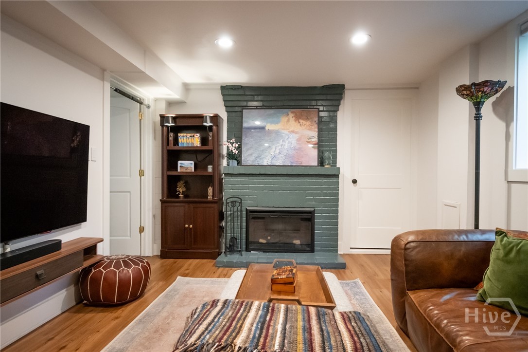 Lower level den with fireplace