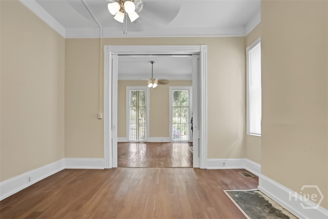 Din. rm, view to liv. rm downstairs