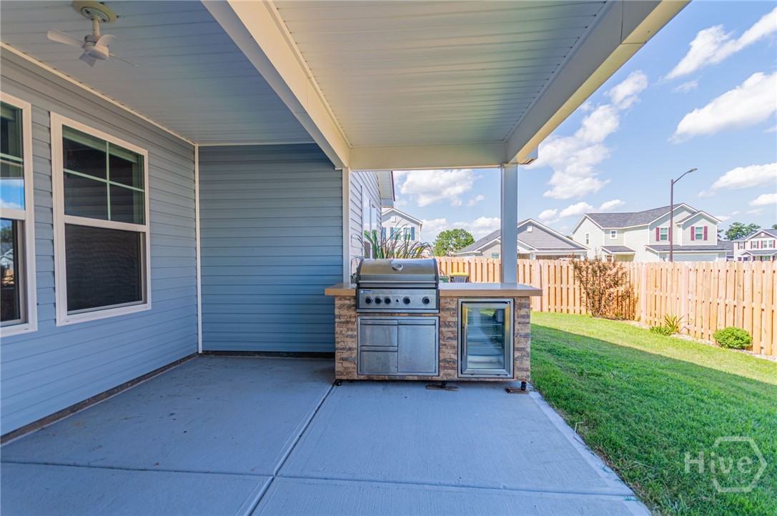 Covered patio with outdoor kitchen