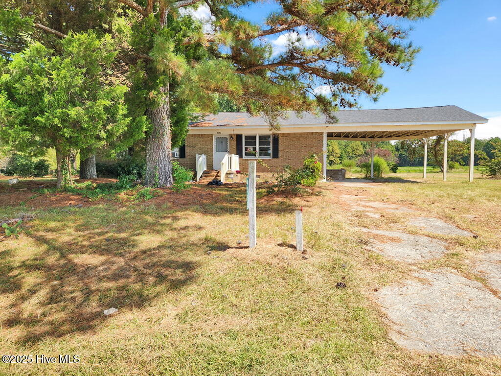 Set against a backdrop of peaceful farmland, this 3-bedroom home offers rural charm. This property offers a great opportunity for buyers looking to add value through updates and personal touches. With a spacious layout, multiple living areas, and a functional floor plan, the home is full of potential. While it does require some TLC, it presents a solid foundation for a renovation project or investment. Situated on a generous lot surrounded by nature, the property offers privacy and room to grow. Conveniently located just minutes from NC-11, it provides easy access to Greenville, Williamston, and surrounding areas. Bring your vision and make this rural retreat your own — schedule a showing today!