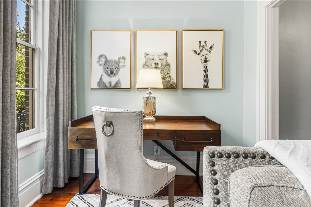 Cute nook with stairs leading to the upper level.
