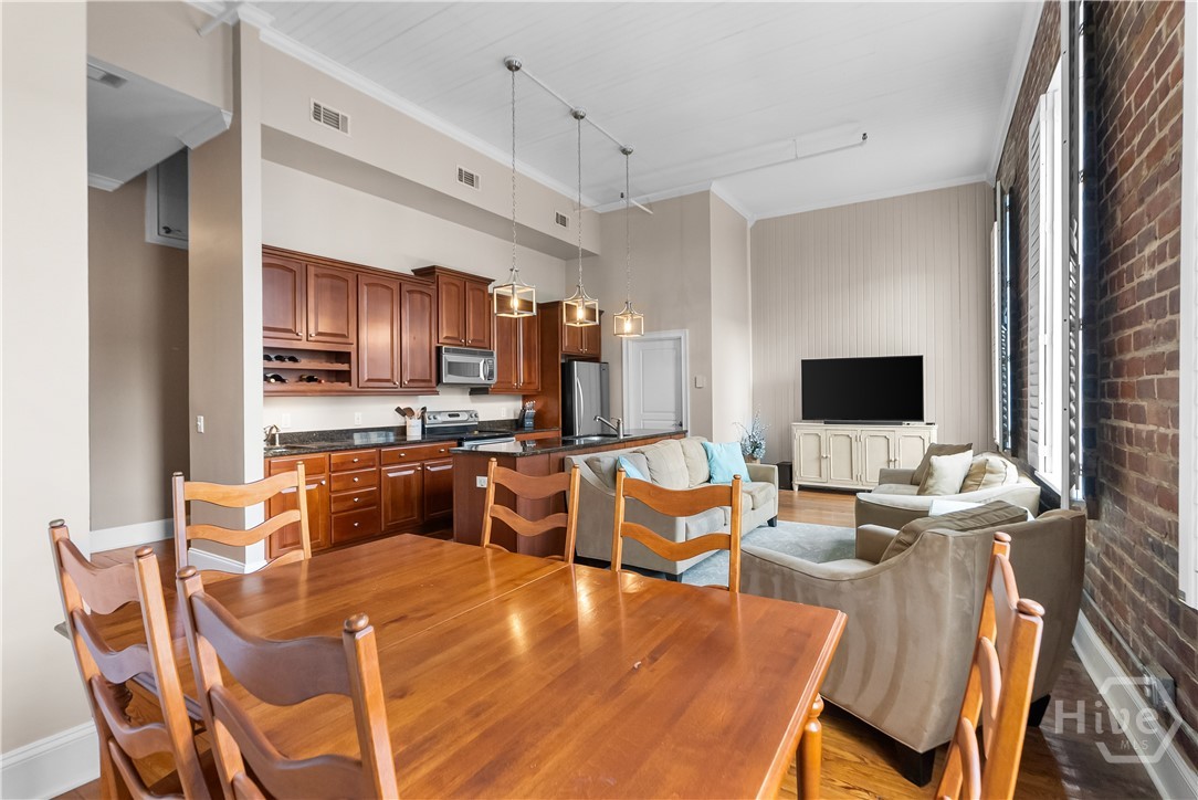 Dining room is open to the living room and kitchen.