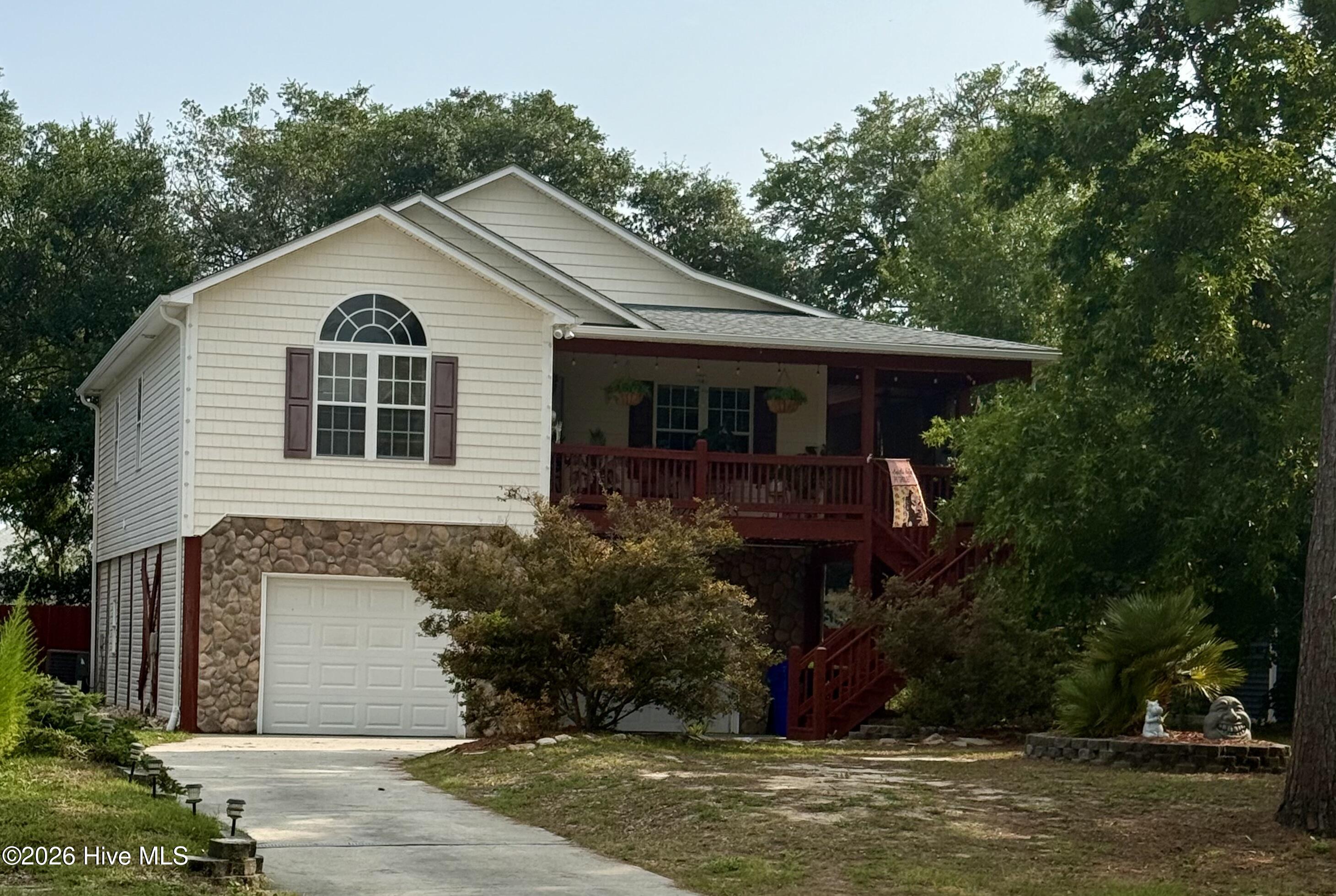 Exterior photo of 1805 W Oak Island Drive, Oak Island, NC 28465. MLS: 100593187