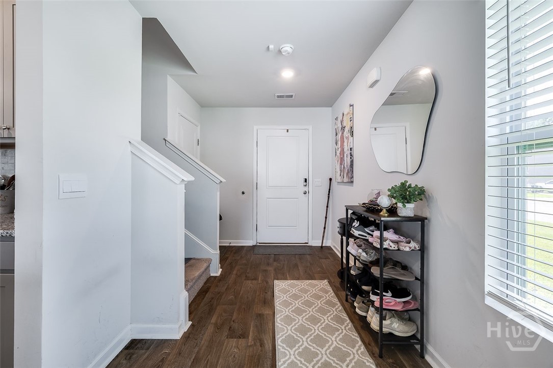 Front entry, showcasing the LVP flooring.