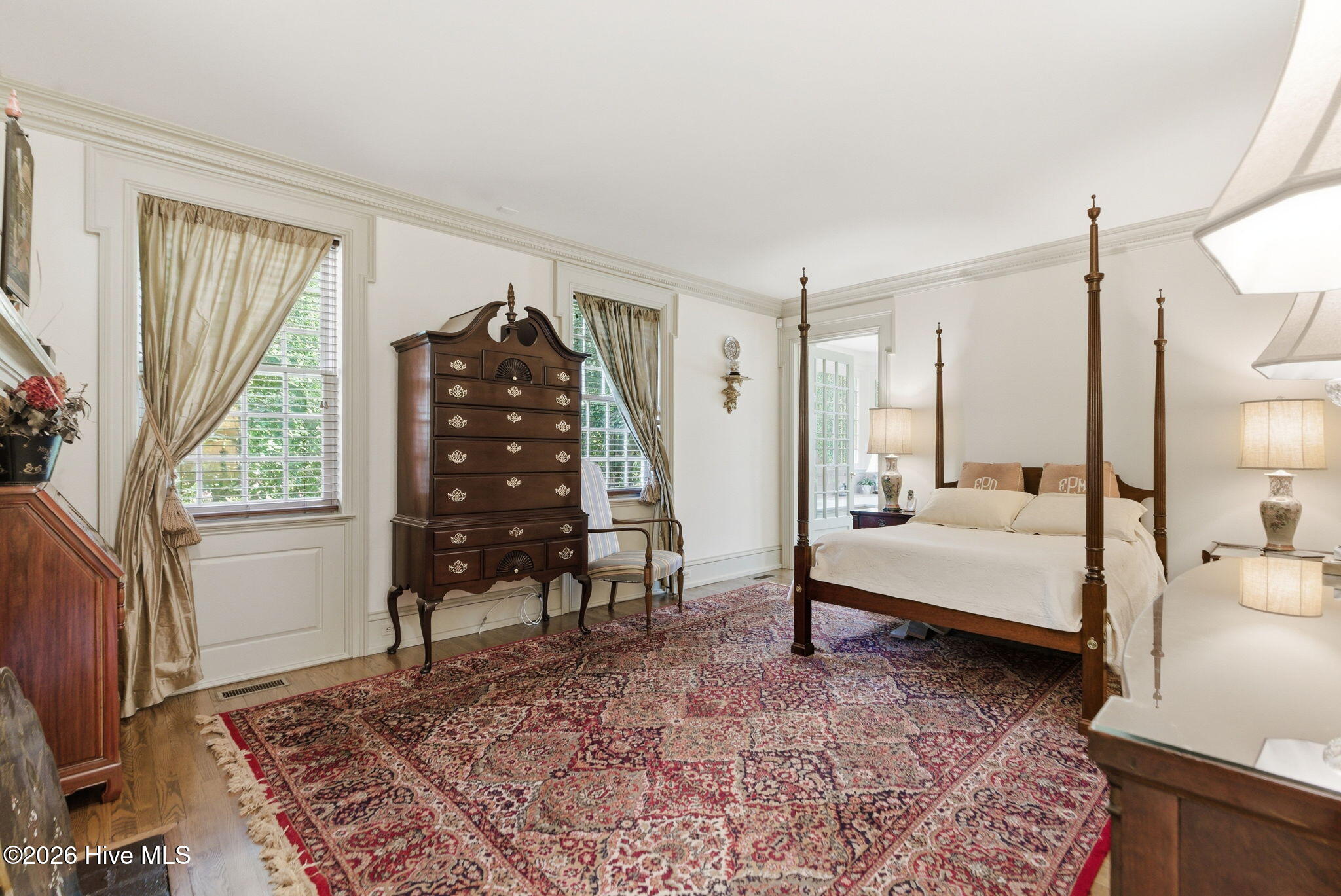 Primary suite addition matching original 1916 proportions and detailing.