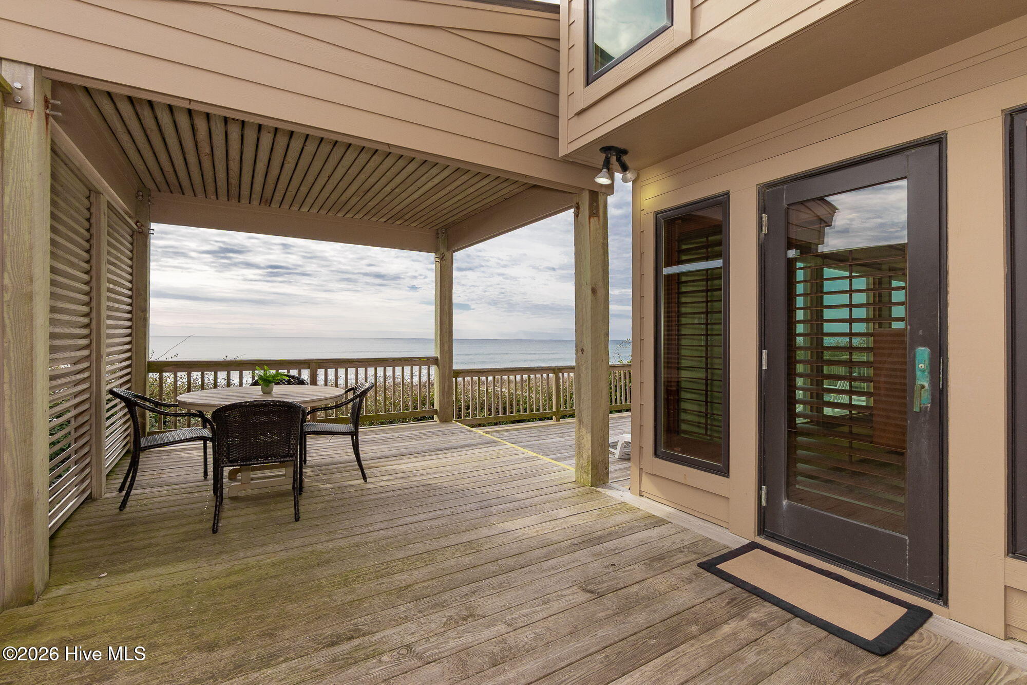 Enjoy outdoor covered dining with a view
