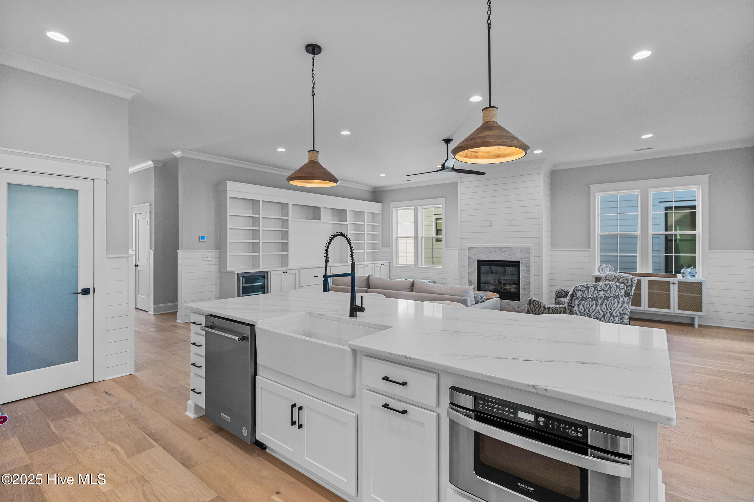 Kitchen opening to living area