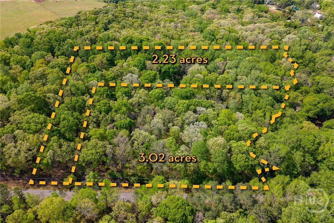 Two parcels included in sale combined 5.25 acres