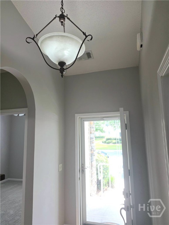 Foyer leads to Great Room with 2 bedrooms to each side.