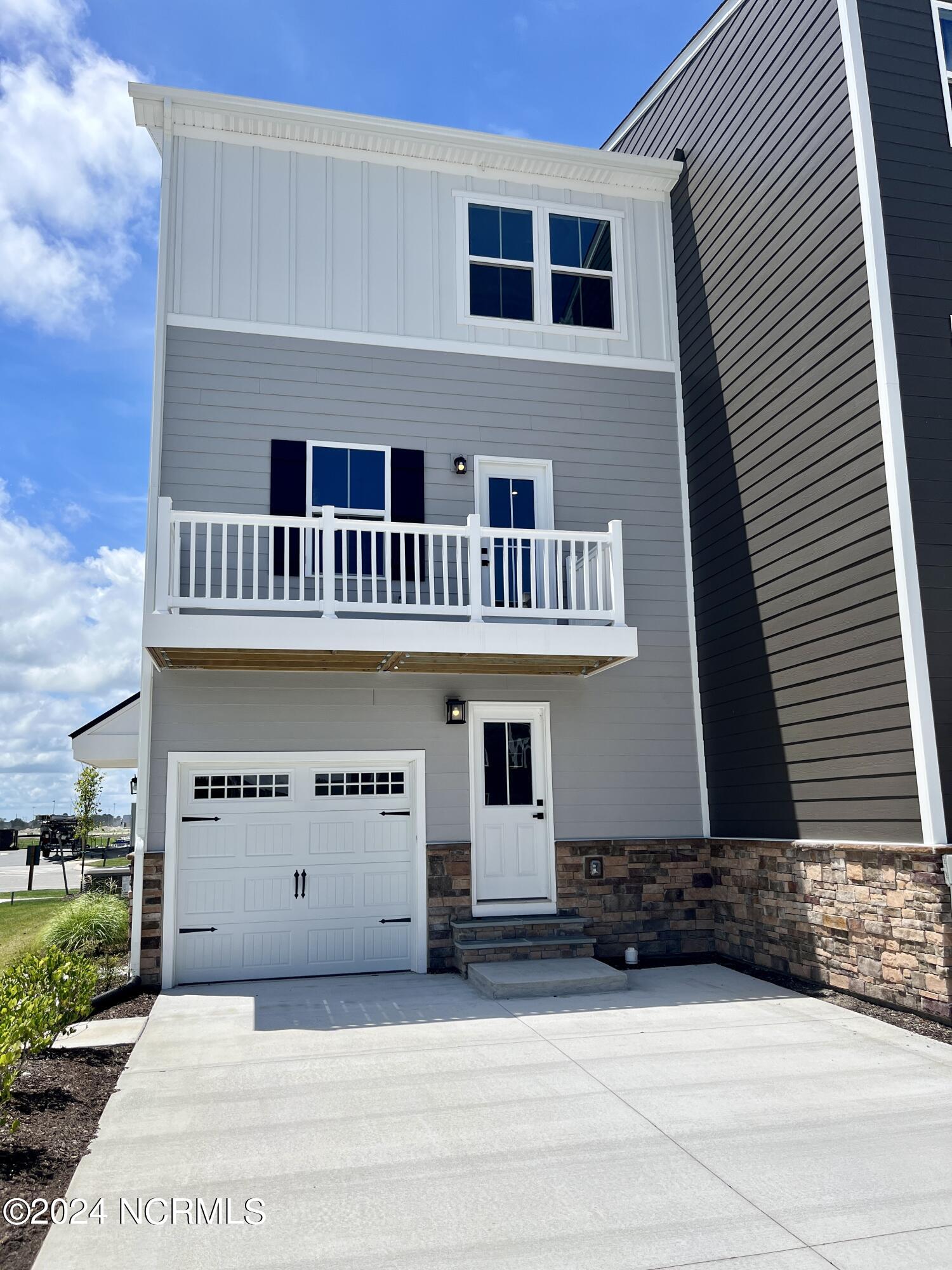Exterior photo of 315 Fost Boulevard, Moyock, NC 27958. MLS: 100591808