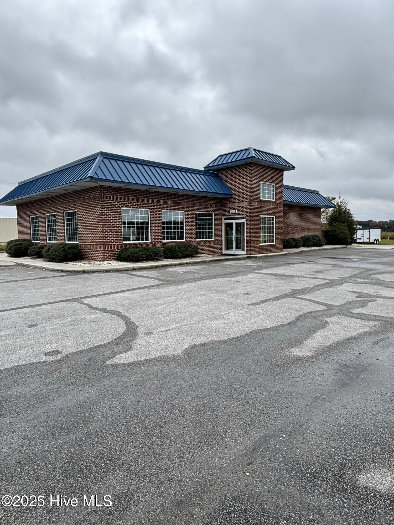 INCOME-PRODUCING Commercial Property on Main Street in Robersonville.  Currently Leased to an operating restaurant, providing Immediate Cash Flow.  Situated in a High-Visibility Location directly across from Food Lion and positioned beside Dollar Tree and Handy Mart, ensuring steady traffic and exposure.  Flexible Commercial Zoning Allows Multiple Uses.  Excellent Opportunity for Investors seeking Strong Visibility and Stable Tenant Occupancy.Listing apart of portfolio sale with other properties, MLS numbers: 100540088 , 100540082 , 100540080 , 100540078 , 100540085 , 100540081