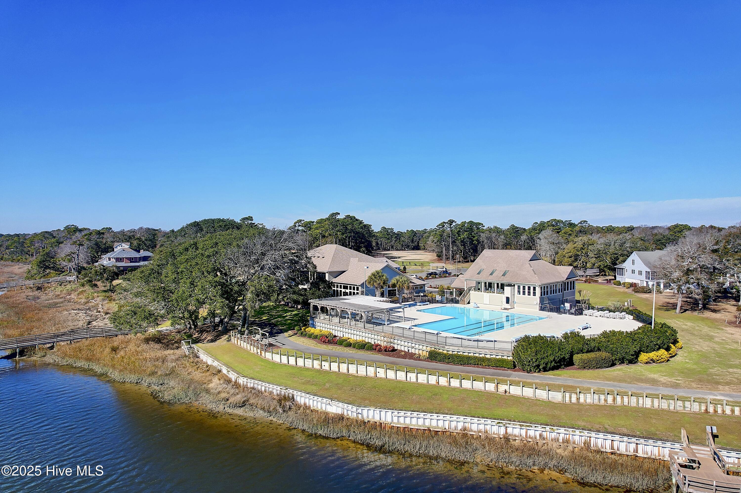 Waterfront Pool, Clubhouse and the 18th Hole.