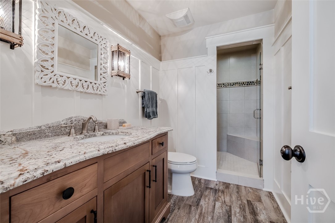 Cottage bathroom with walk in tiled shower