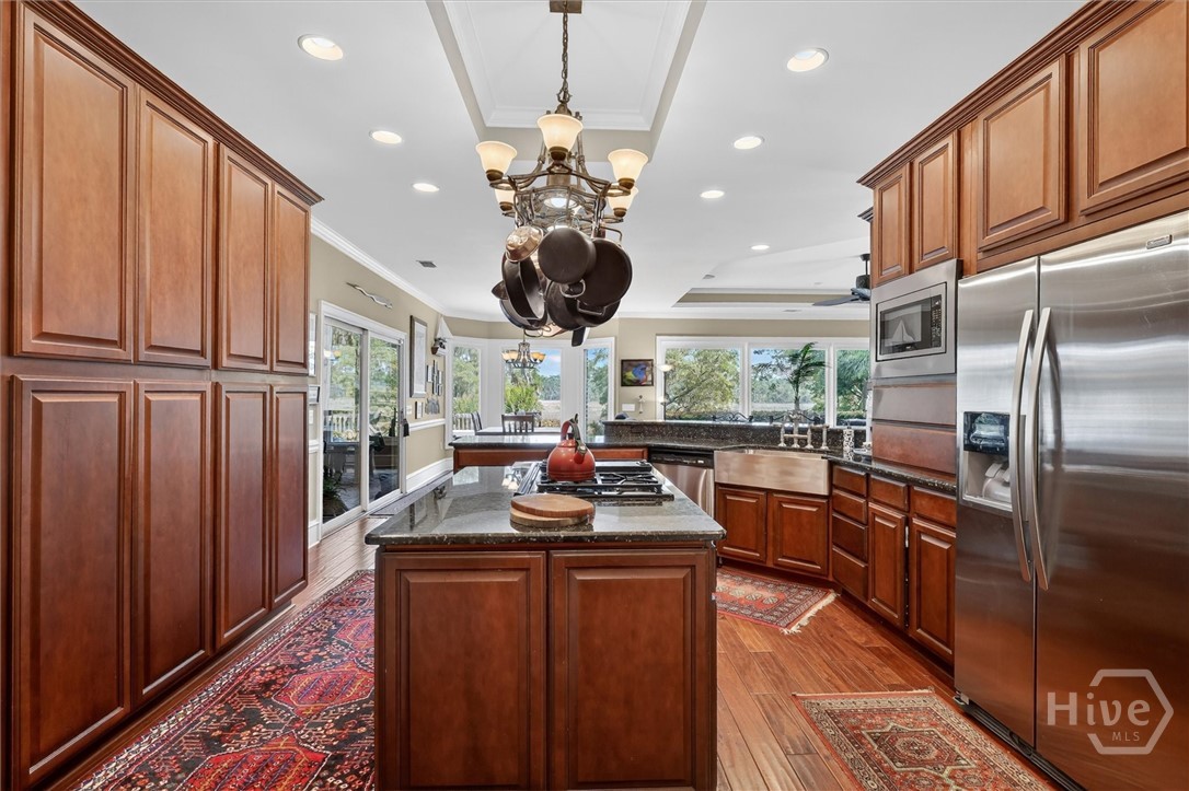 Chef's kitchen with gas range, tons of cabinetry,