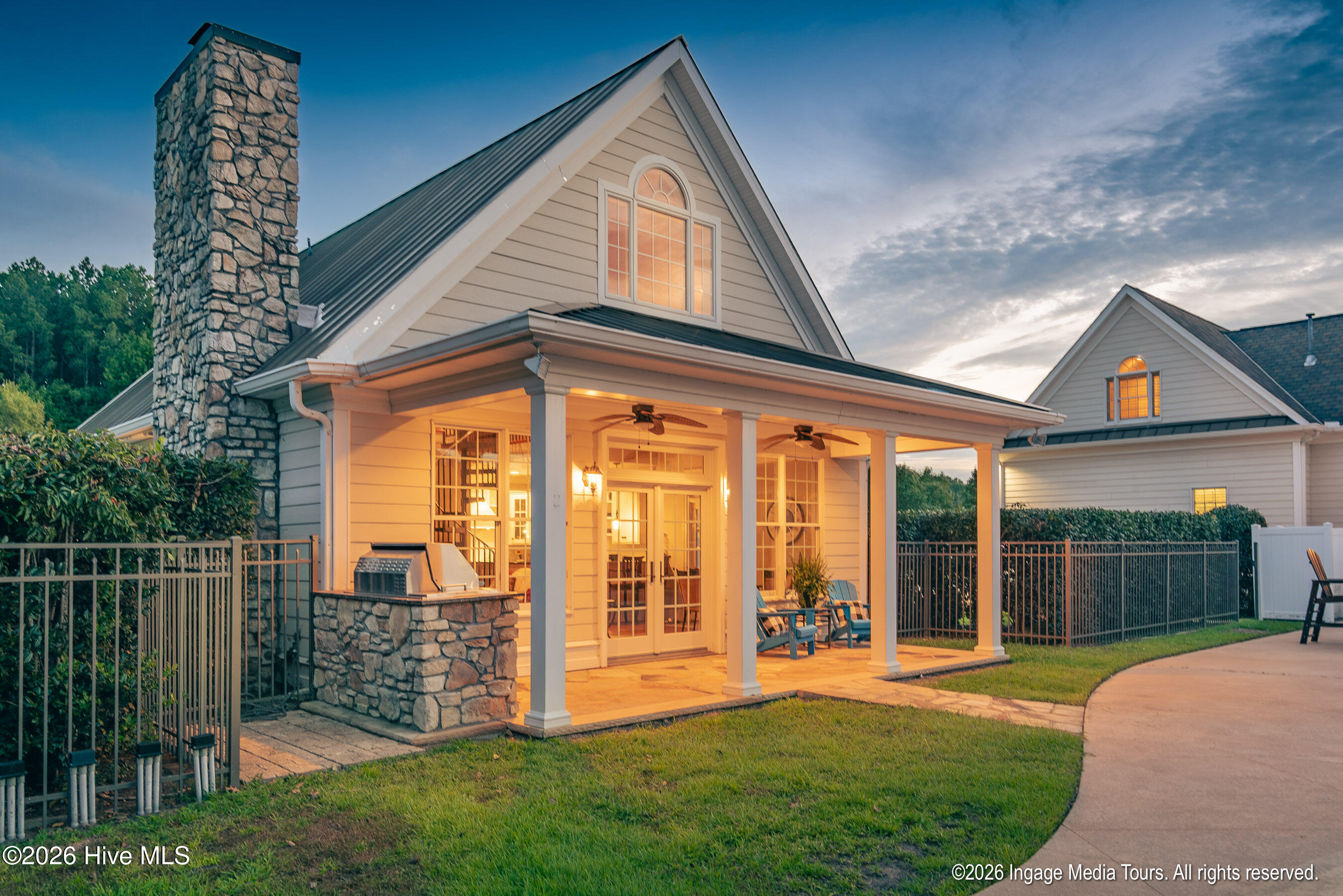 Guest house features include fireplace, sleep quarters down, loft up, kitchen with Viking gas range and more