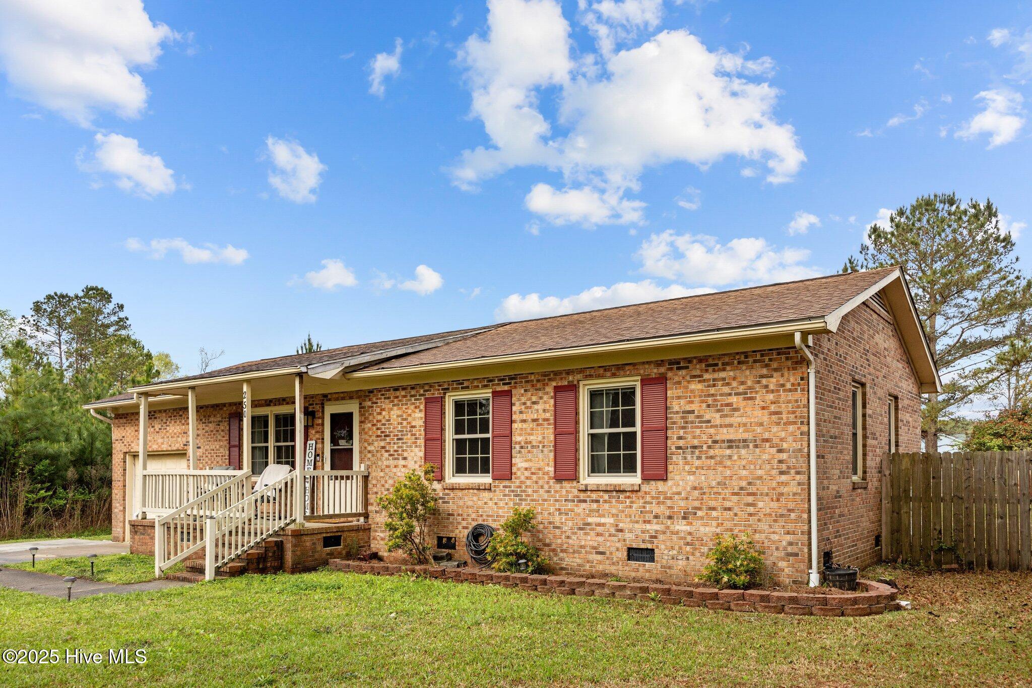 Cute brick starter home outside of the city limits with no HOA featuring 3 bedrooms and 2 full bathrooms. The recently updated kitchen has a farm sink, oversized drawers, butcher block counter tops and lights under the cabinets. This home is sure to please and ready for it's new owner. Private location with almost a half acre lot with fenced back yard. Schedule your VIP showing today.