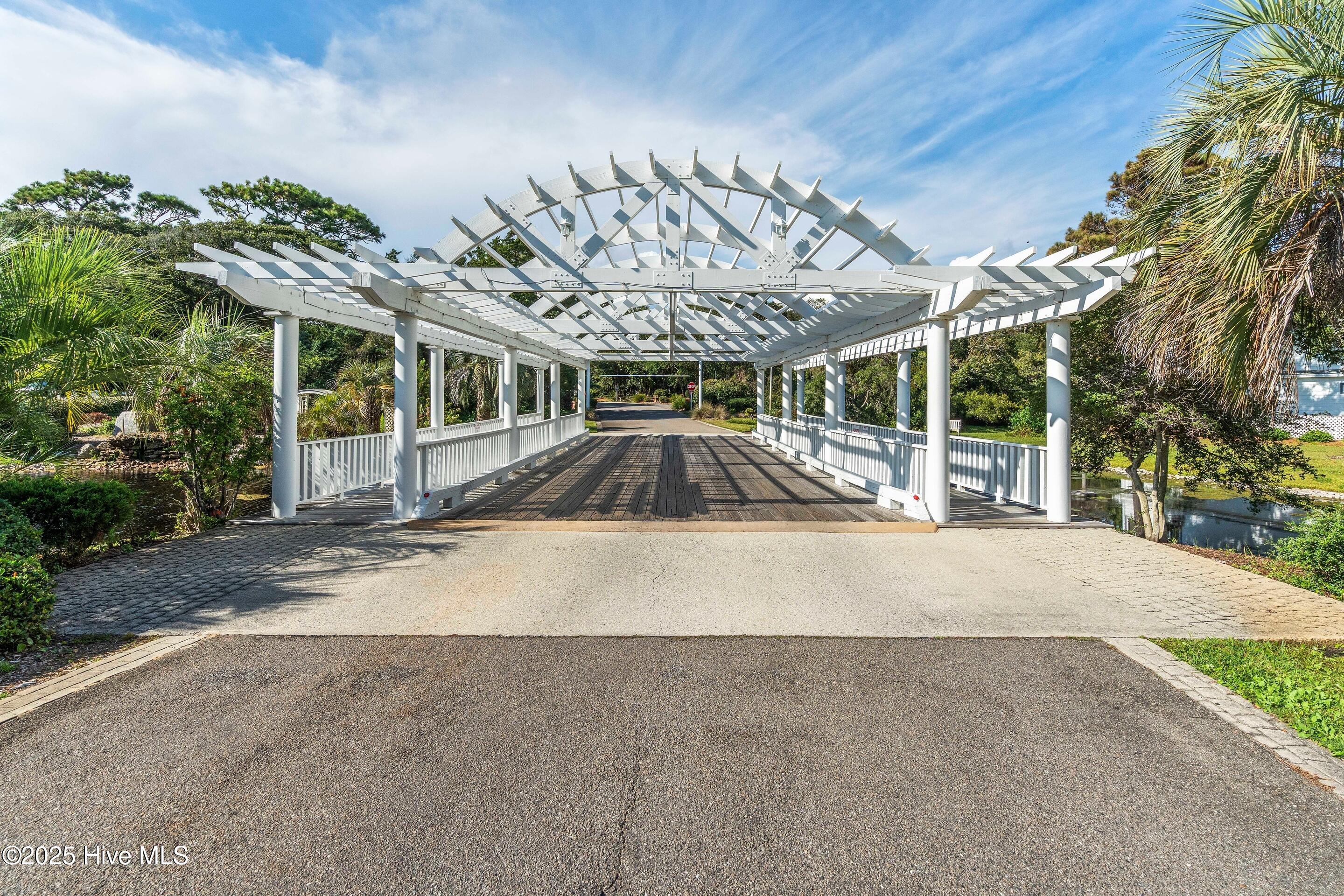 501 Periwinkle Way, Caswell Beach, NC 28465 – photo 16: mls-DSC02306