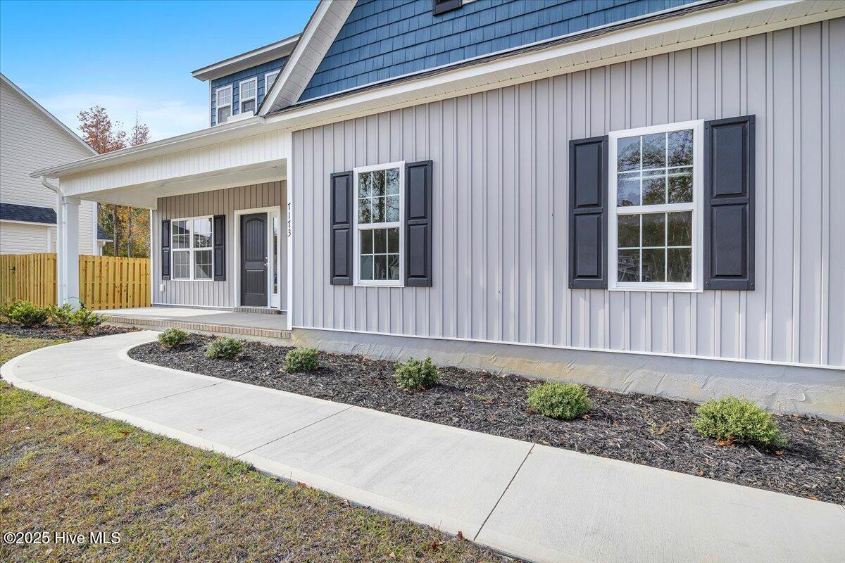 143 Bayside Drive 22, Sneads Ferry, NC 28460 – photo 5: 006-Final Sample Model Home Compl-RJREM-