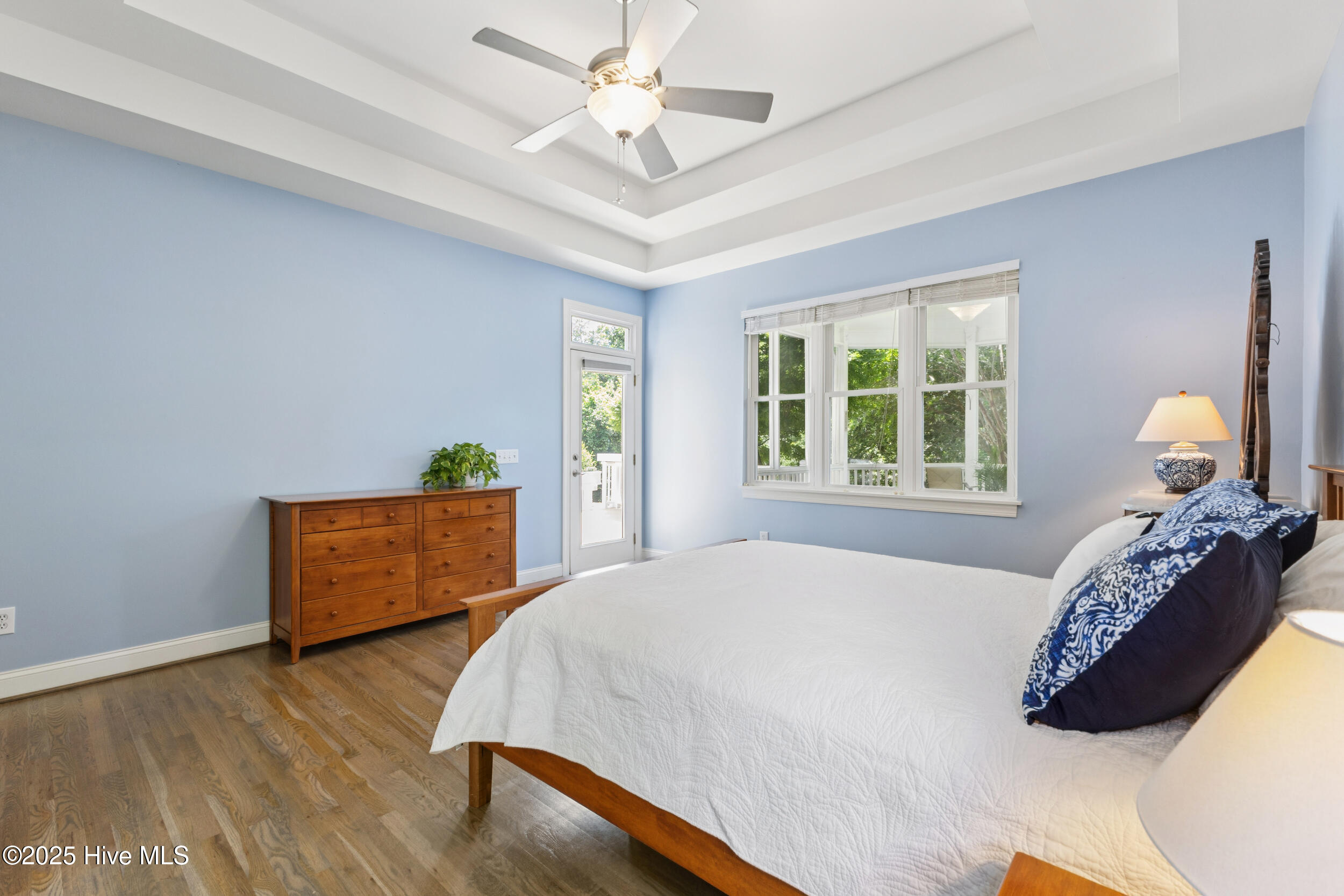 107 N Stargazer Court, Hampstead, NC 28443 – photo 15: Primary Bedroom with Door to Back Porch