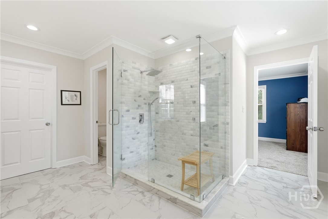 Glass enclosed walk-in shower