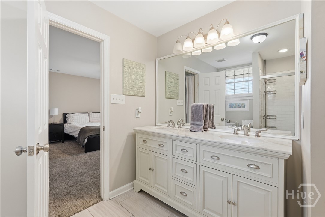 Jack & Jill bathroom on upper level with dual vanity sinks