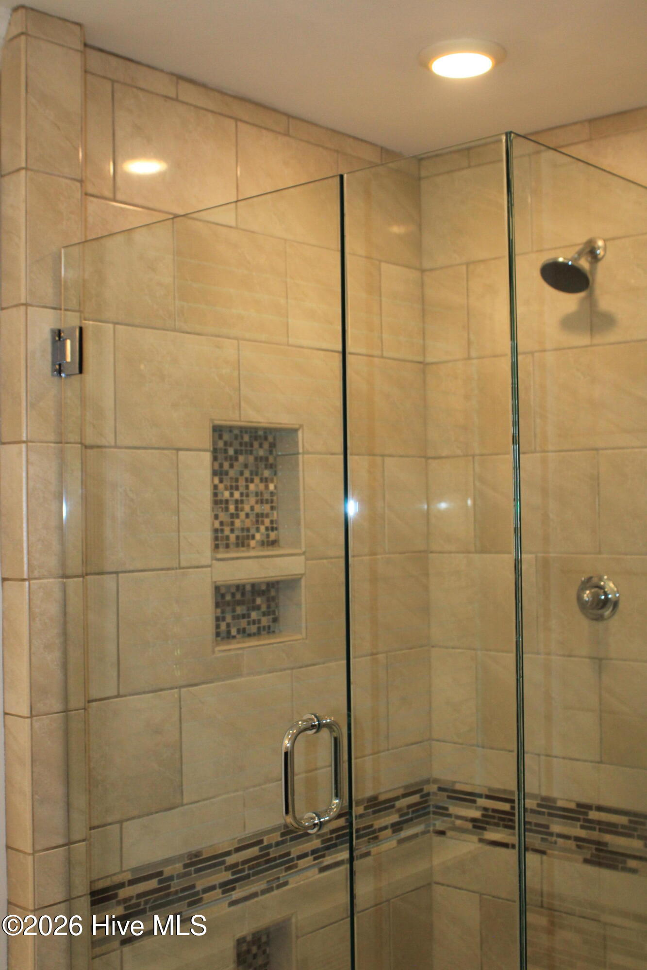 Custom built shower, fully tiled w/ multiple sprayers
